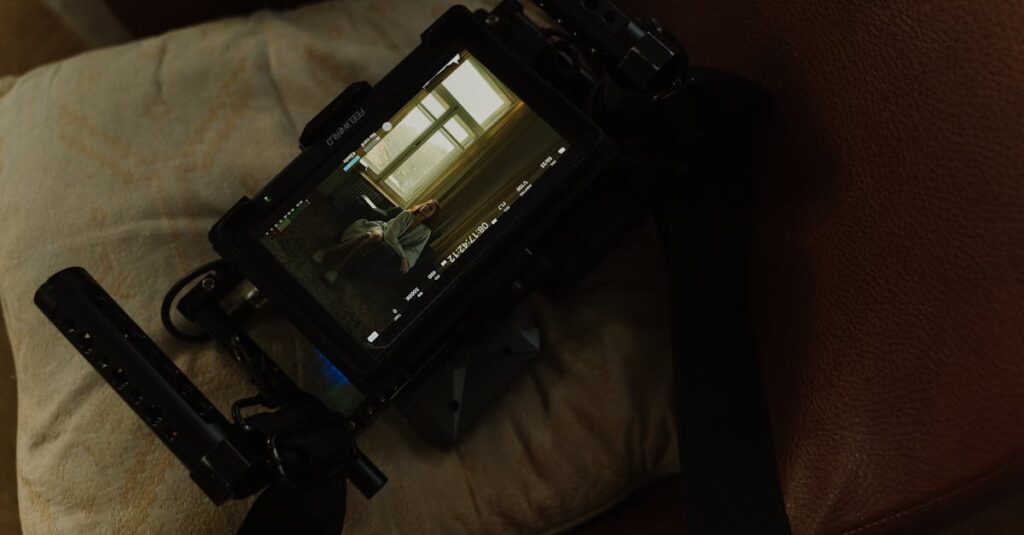 Camera screen displays a woman indoors, showing a cinematic scene.