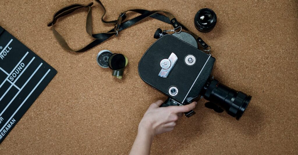 A vintage analog camera and clapboard on a cork surface, representing classic cinematography.