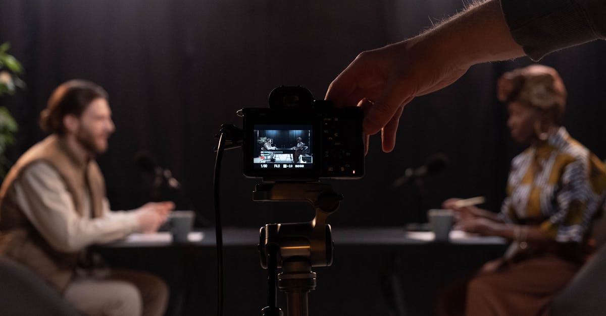 Professional podcast session recording with diverse hosts in studio.