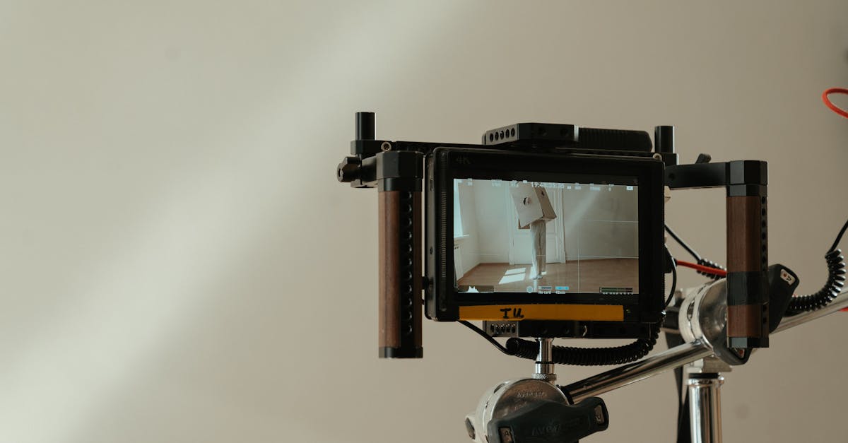 Close-up of a video monitor capturing a creative scene on a film set, emphasizing professional equipment.
