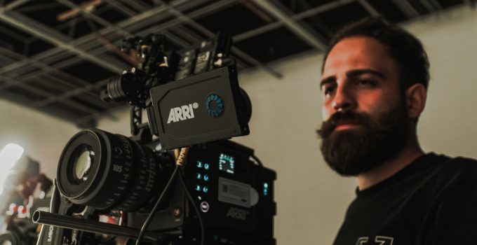 Behind the scenes with a filmmaker operating a professional camera during filming in İstanbul.