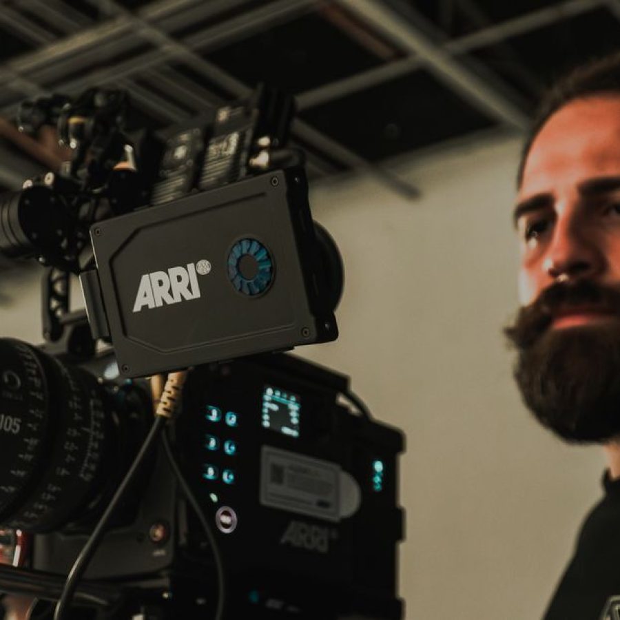 Behind the scenes with a filmmaker operating a professional camera during filming in İstanbul.