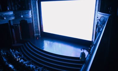 Explore the grandeur of Budapest's historic cinema, showcasing its rich architectural details and audience seating.