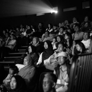 A black and white photo of a crowd of people