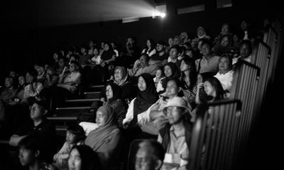 A black and white photo of a crowd of people